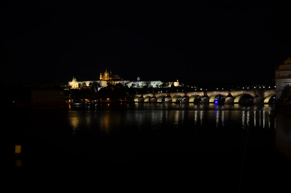 Charles Bridge at night and during the day.
