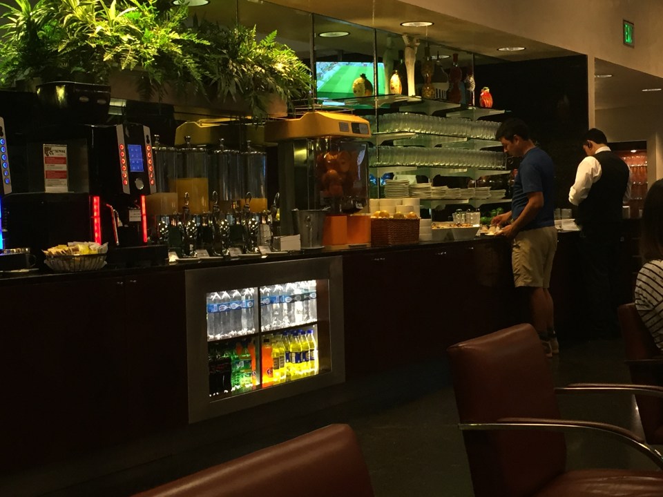 Free food, unlimited fresh squeezed orange juice and free showers in the first class American Airlines lounge Lima, Peru